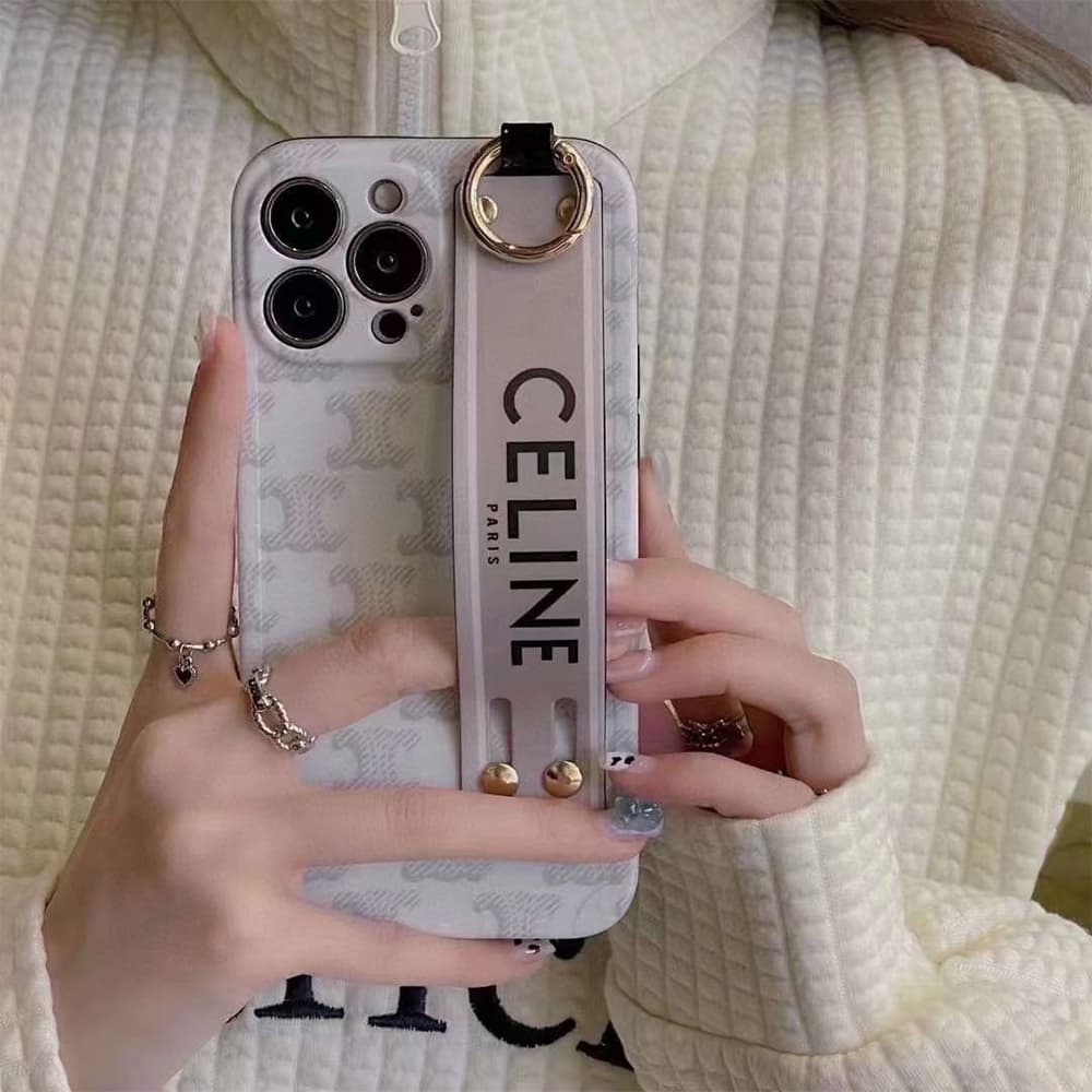 Celine Luxury iPhone Case - Triomphe Pattern with Leather Wrist Strap & Ring Stand (TPU Protective Case) Celine Luxury iPhone Case - Triomphe Pattern with Leather Wrist Strap & Ring Stand (TPU Protective Case)