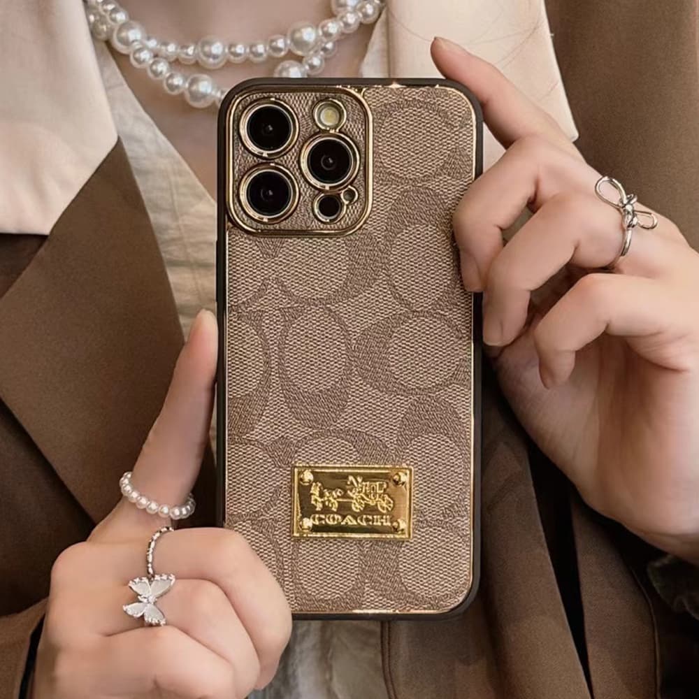 Coach Luxury Phone Case - Signature Print & Metal Logo iPhone Cover for Apple Devices Coach Luxury Phone Case - Signature Print & Metal Logo iPhone Cover for Apple Devices