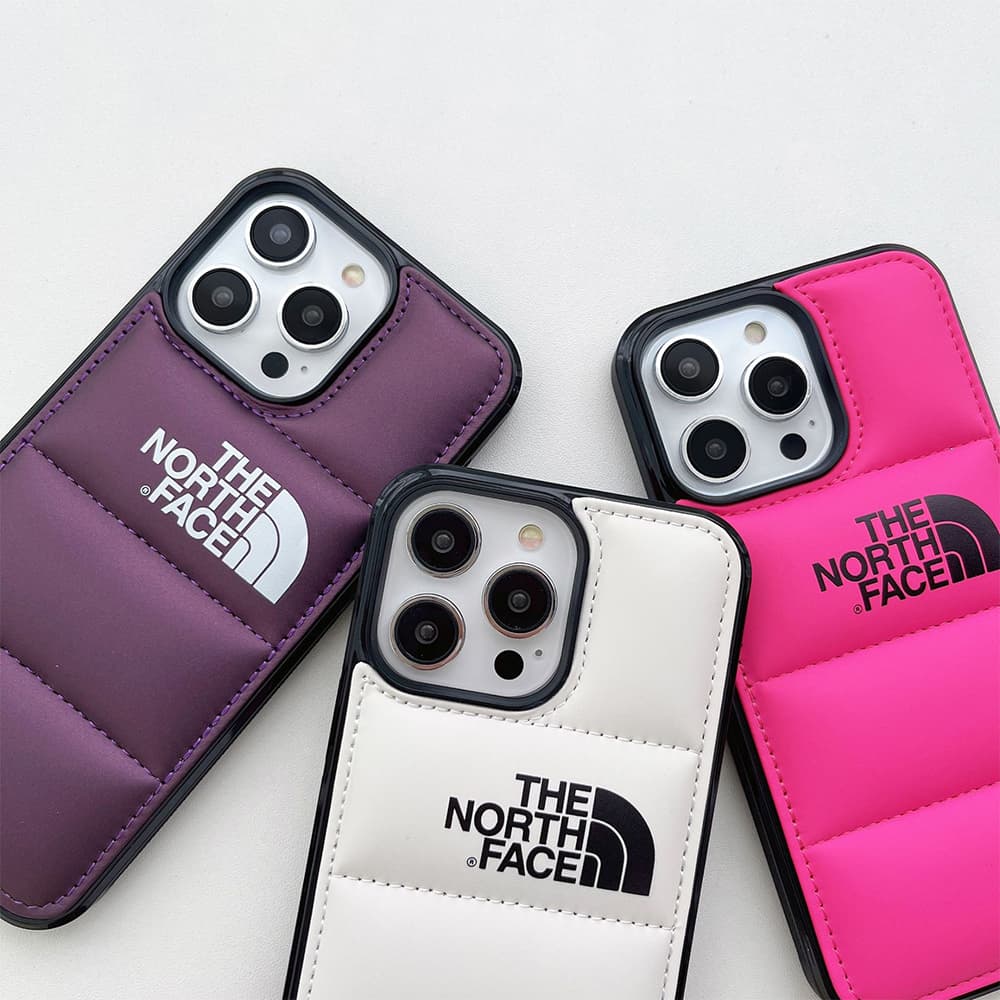 The North Face Puffer Phone Case - Quilted Outdoor Design for iPhone (Multiple Colors) The North Face Puffer Phone Case - Quilted Outdoor Design for iPhone (Multiple Colors)