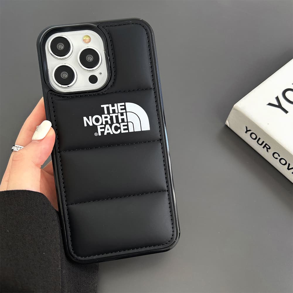 The North Face Puffer Phone Case - Quilted Outdoor Design for iPhone (Multiple Colors) The North Face Puffer Phone Case - Quilted Outdoor Design for iPhone (Multiple Colors)