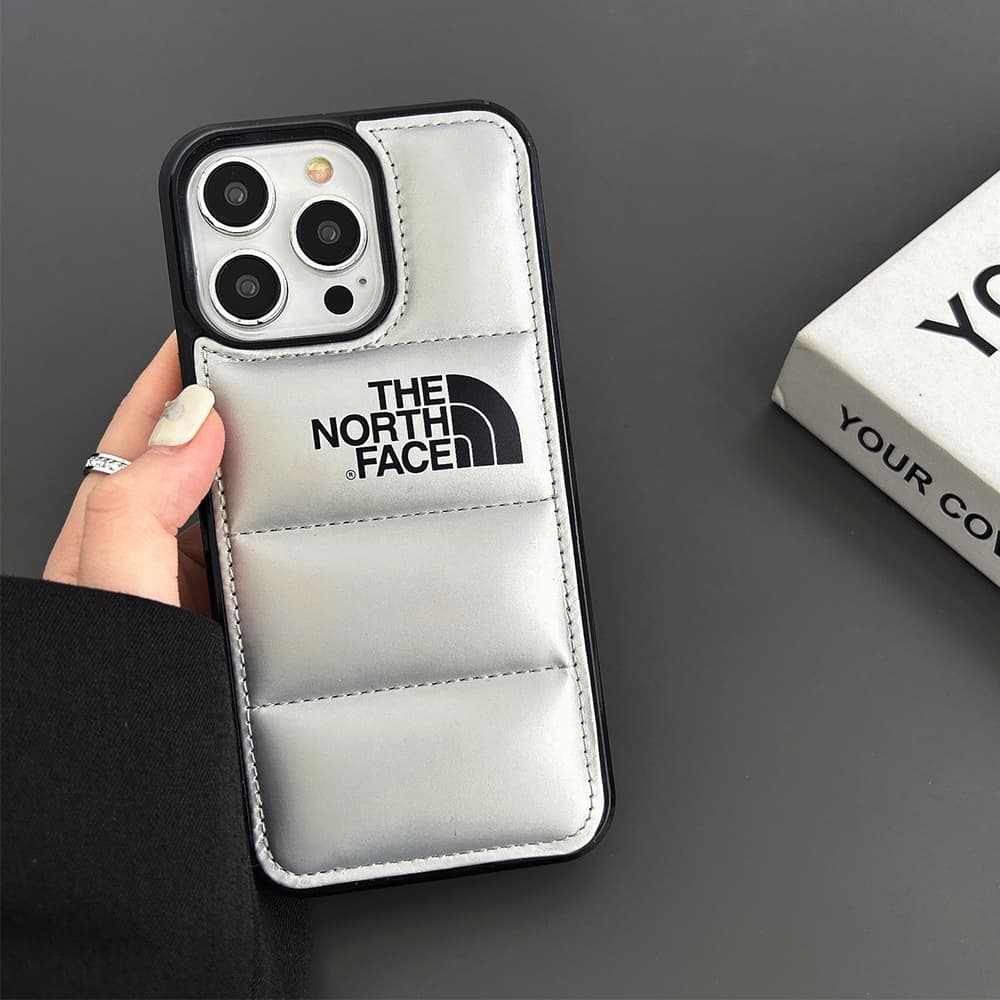 The North Face Puffer Phone Case - Quilted Outdoor Design for iPhone (Multiple Colors) The North Face Puffer Phone Case - Quilted Outdoor Design for iPhone (Multiple Colors)