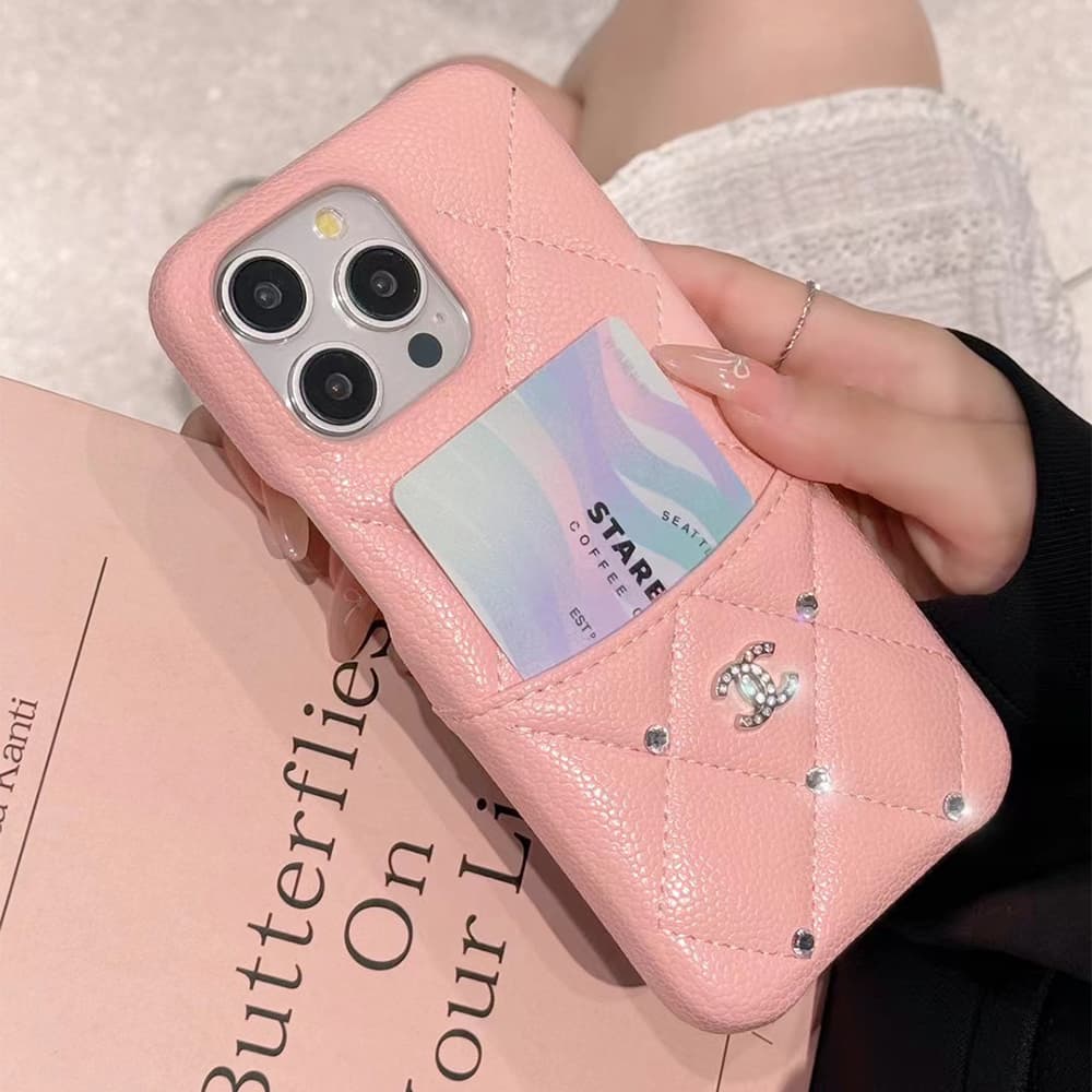 Chanel Luxury iPhone Case - Quilted Diamond Stitch & CC Logo with Crystals (Multiple Colors) Chanel Luxury iPhone Case - Quilted Diamond Stitch & CC Logo with Crystals (Multiple Colors)