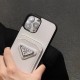 Prada Luxury iPhone Case - Signature Triangle Logo with Card Slot for (Black/White) Prada Luxury iPhone Case - Signature Triangle Logo with Card Slot for (Black/White)