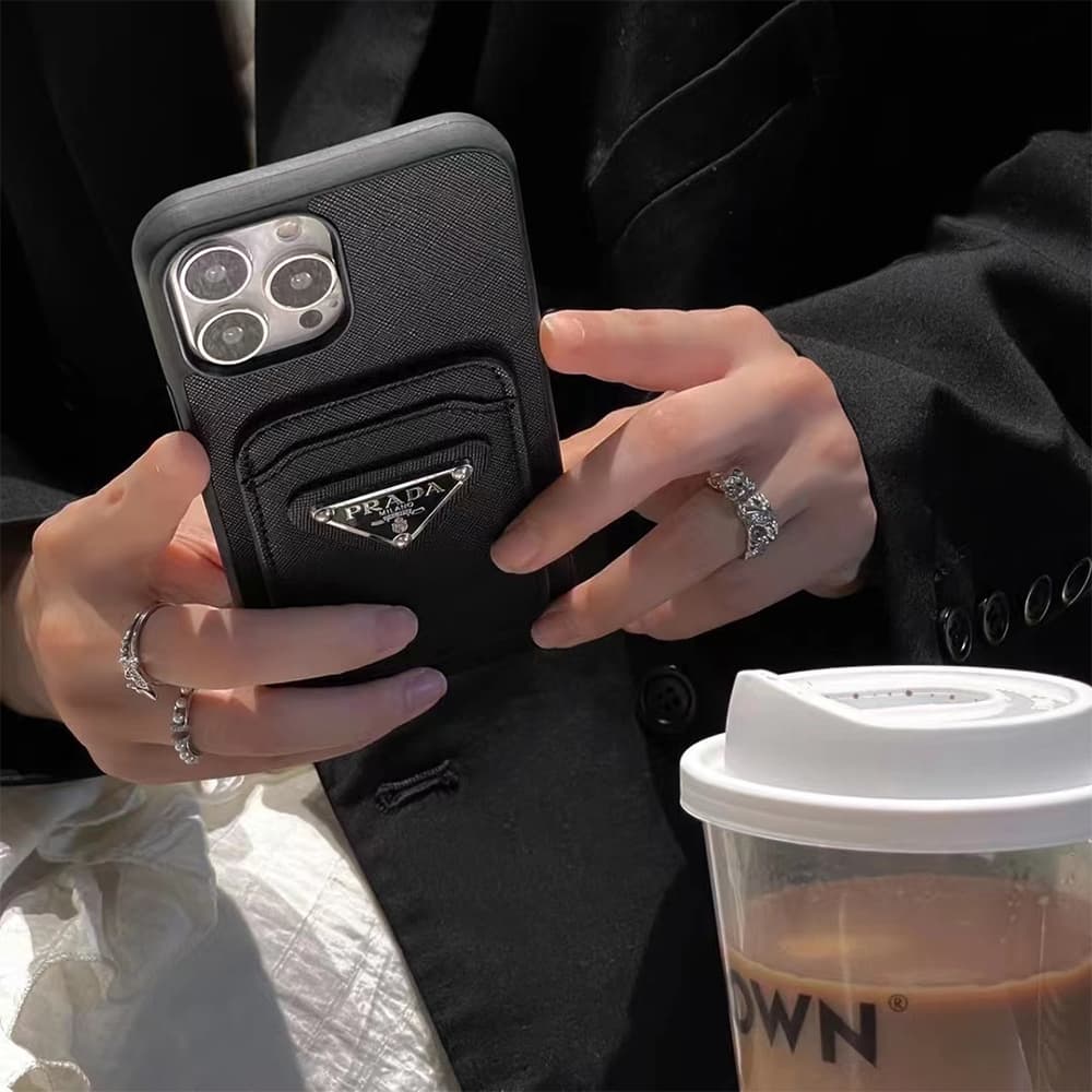 Prada Luxury iPhone Case - Signature Triangle Logo with Card Slot for (Black/White) Prada Luxury iPhone Case - Signature Triangle Logo with Card Slot for (Black/White)