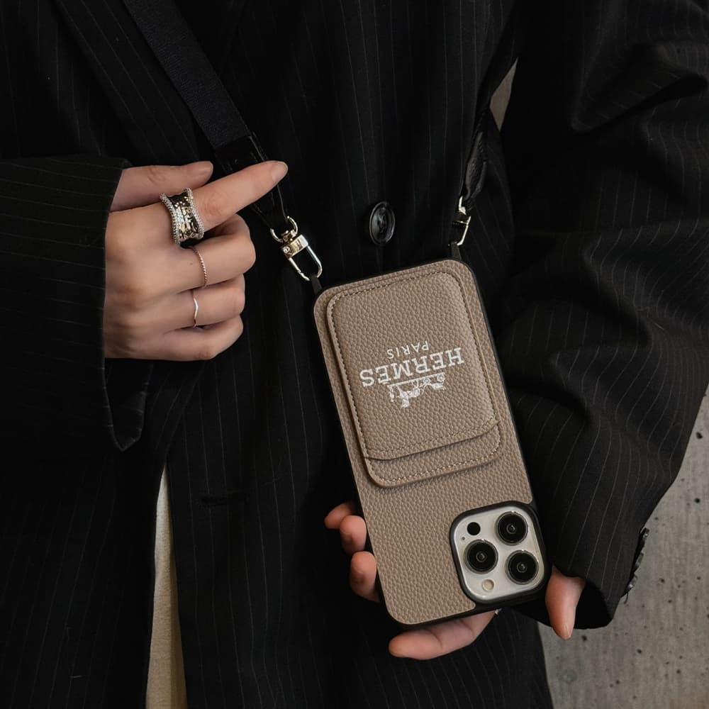 Hermès Luxury iPhone Case - Signature Carriage Design with Detachable Lanyard for (4 Colors) Hermès Luxury iPhone Case - Signature Carriage Design with Detachable Lanyard for (4 Colors)