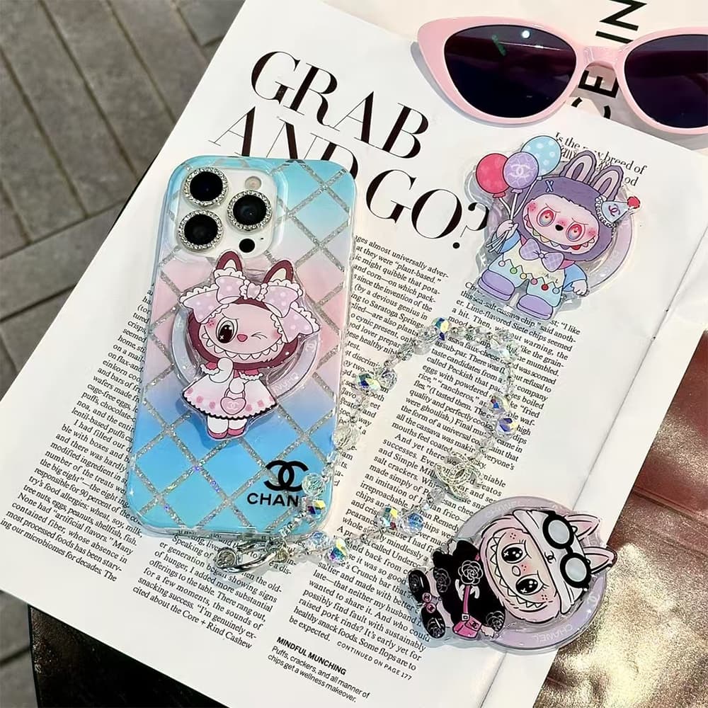 CHANEL Luxury iPhone Case - Glitter Quilted Design with Labubu Magnetic Stand (Magsafe Compatible) CHANEL Luxury iPhone Case - Glitter Quilted Design with Labubu Magnetic Stand (Magsafe Compatible)