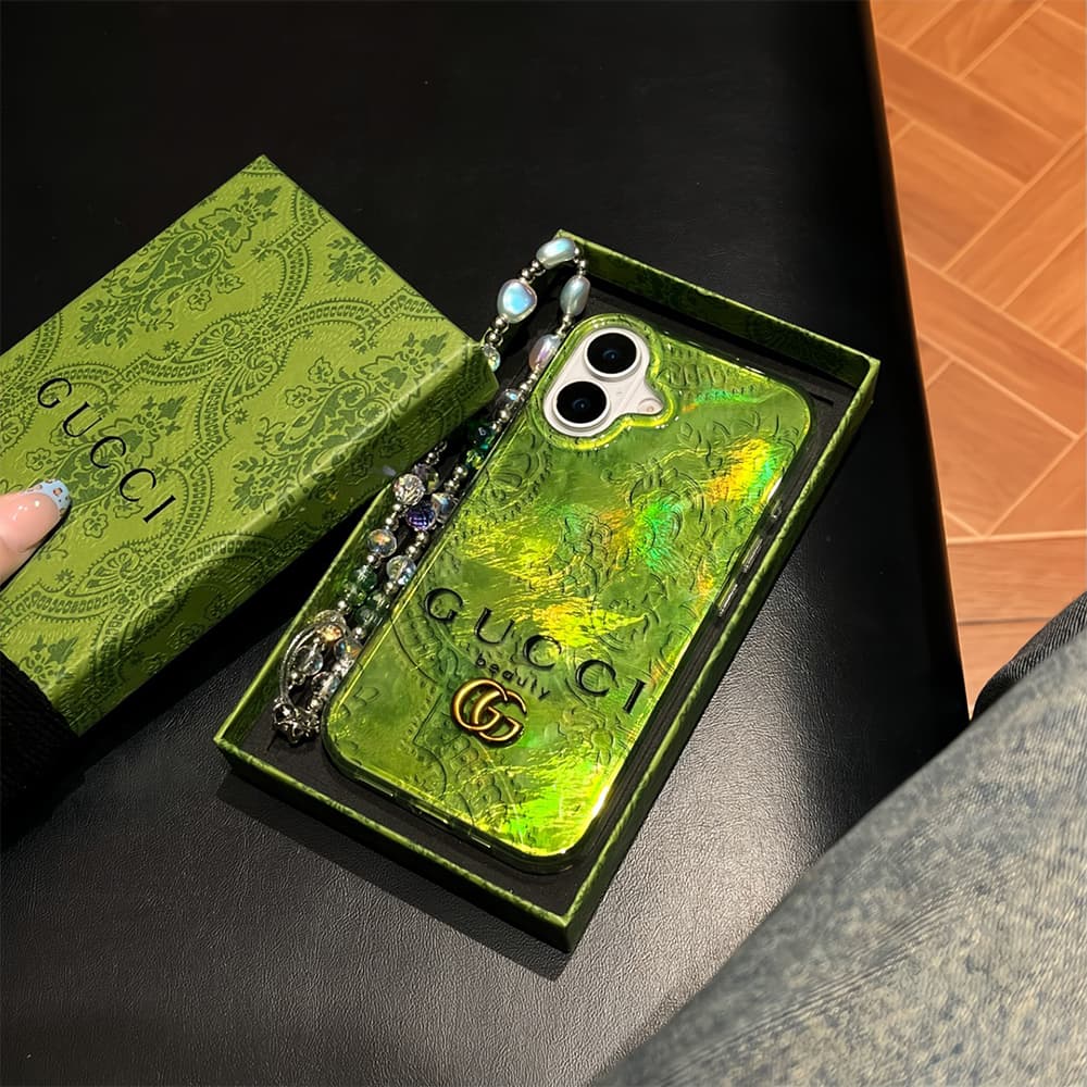 Gucci Iridescent Green iPhone Case with Gold GG Logo & GUCCI Beauty Text