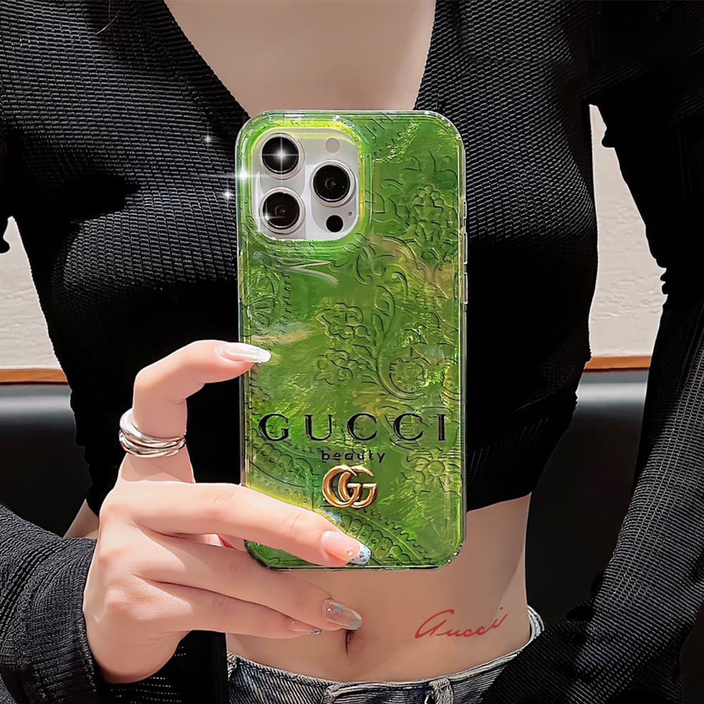 Gucci Iridescent Green iPhone Case with Gold GG Logo & GUCCI Beauty Text