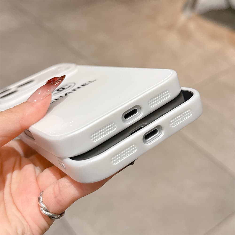 Chanel CC Logo with Camera Lens Protector in Classic White iPhone Case