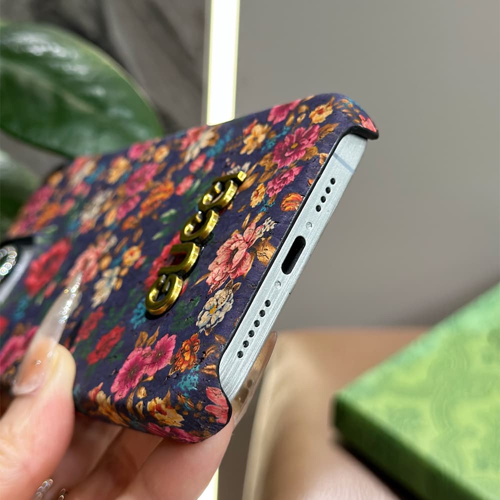 Gucci Peony Floral Cork 4-Sided Cutout Metal Logo iPhone Case